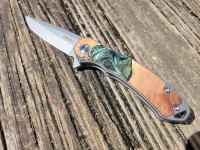 Carved pocket knives